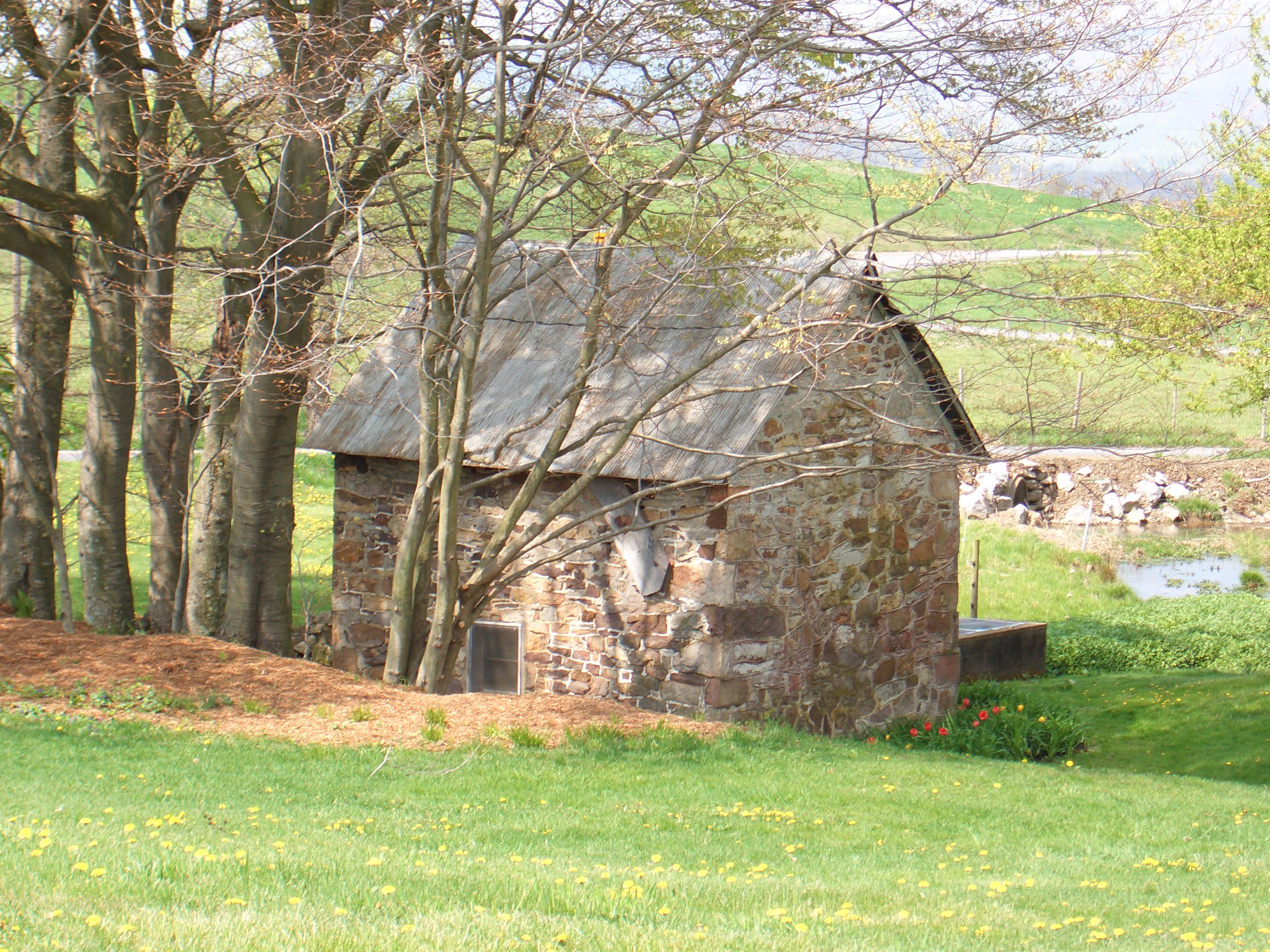 The stone springhouse at Shady Spring Farm